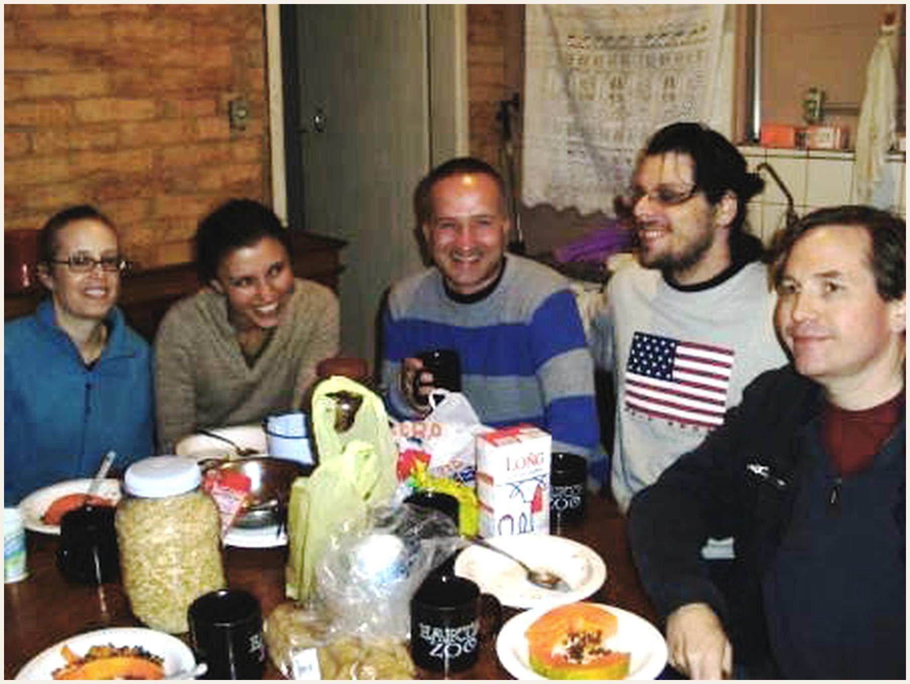 Karl Widerquist and other visitors standing outdoors during a visit connected to ReCivitas in Brazil.